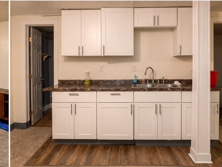 Basement kitchenette with stove and sink