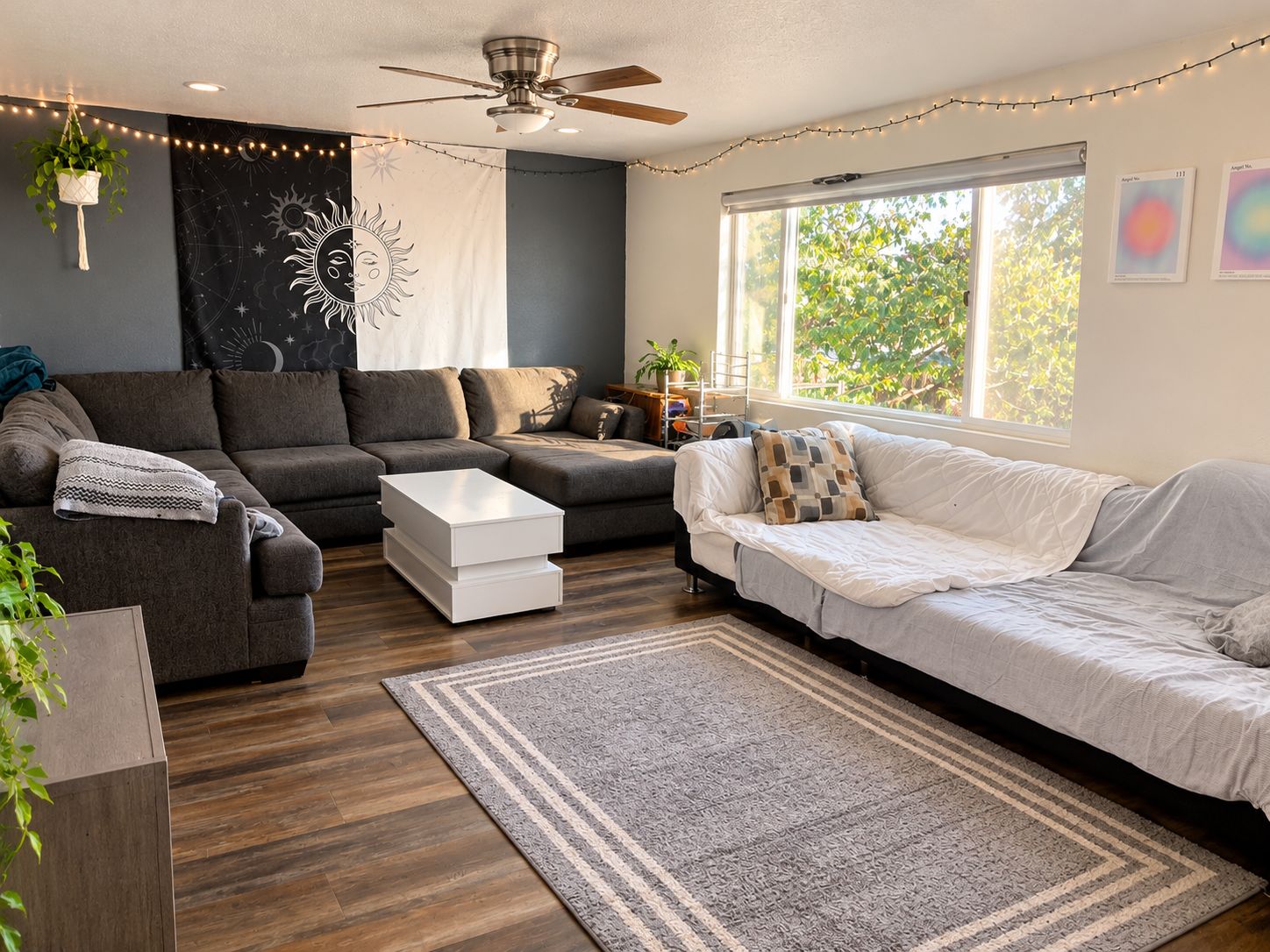 Main living room with window and sofas