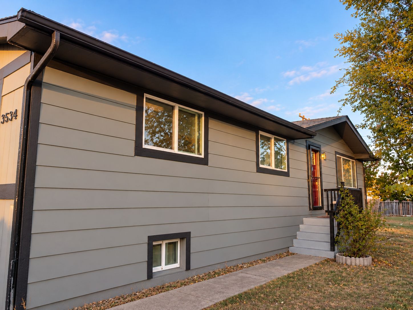 Side exterior of 3534 Pueblo Street at golden hour